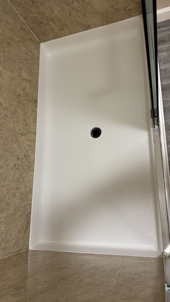 Shower pan after crack repair by Golden Touch-Up