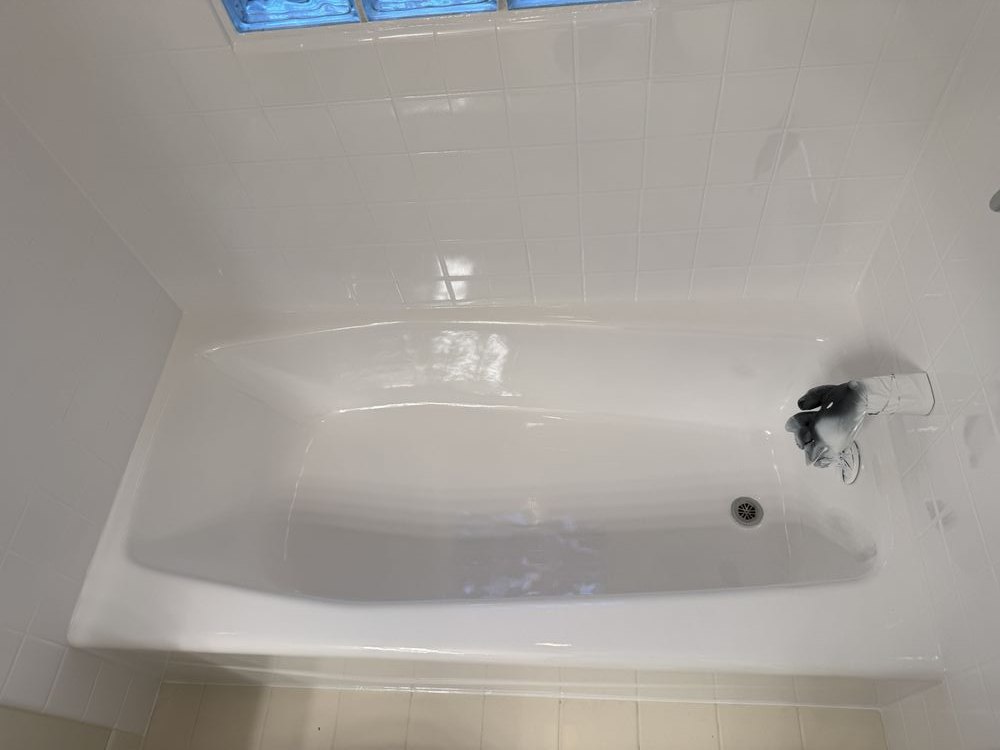 Bathtub after rust stain repair and reglazing &mdash; San Francisco, bright white