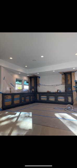 Kitchen cabinet refinishing detail &mdash; spray-finished doors and frames