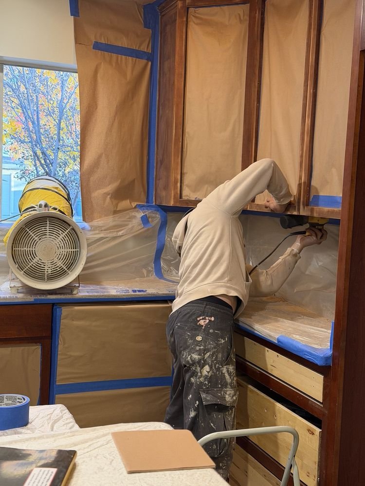 Kitchen cabinet refinishing &mdash; Uppers masked and spray-coated with vented exhaust setup &mdash; Fremont, CA