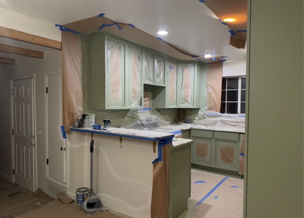Kitchen cabinet refinishing &mdash; Kitchen fully masked and vented during spray application &mdash; Fremont, CA