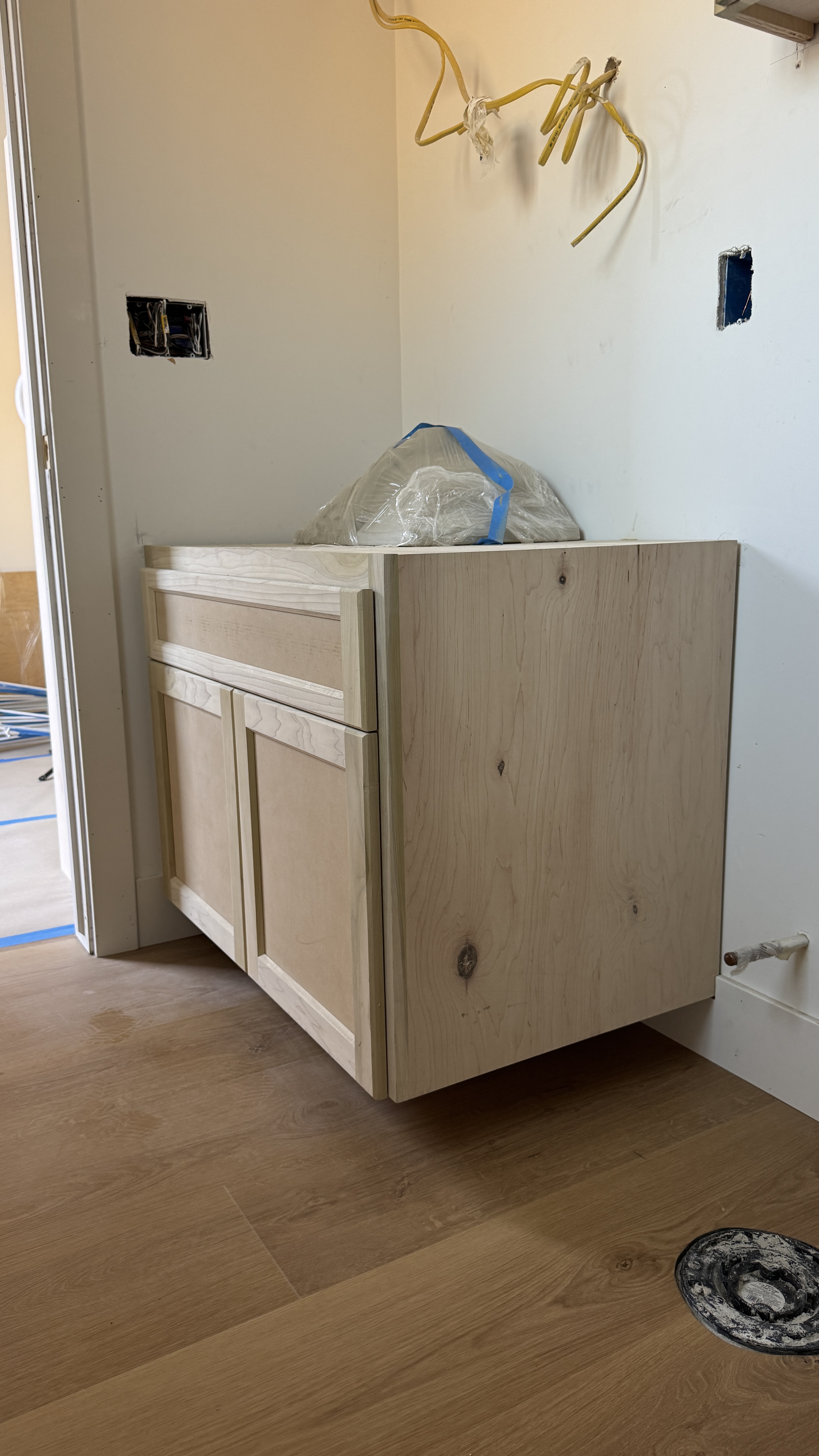 Vanity installation &mdash; Wall cabinet mounted and plumbing roughed in before top install &mdash; Saratoga, CA