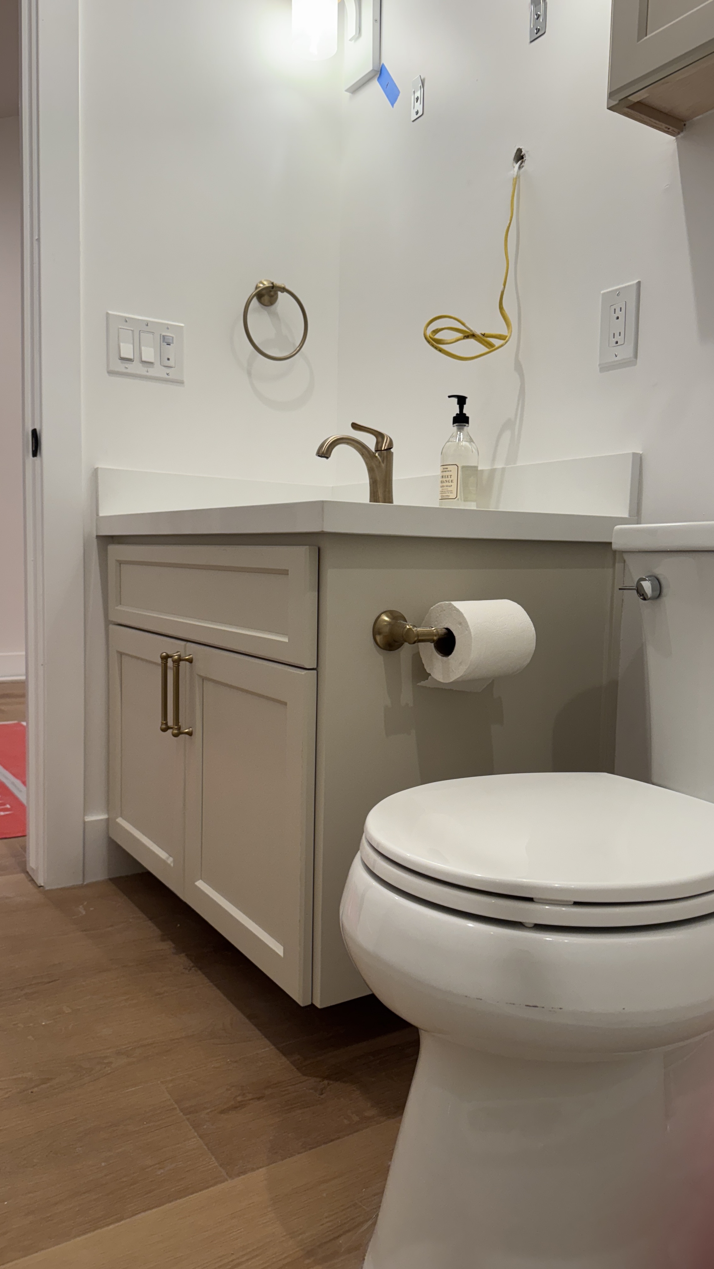 Bathroom cabinet refinishing &mdash; Completed cabinet above toilet, ready for use &mdash; Saratoga, CA