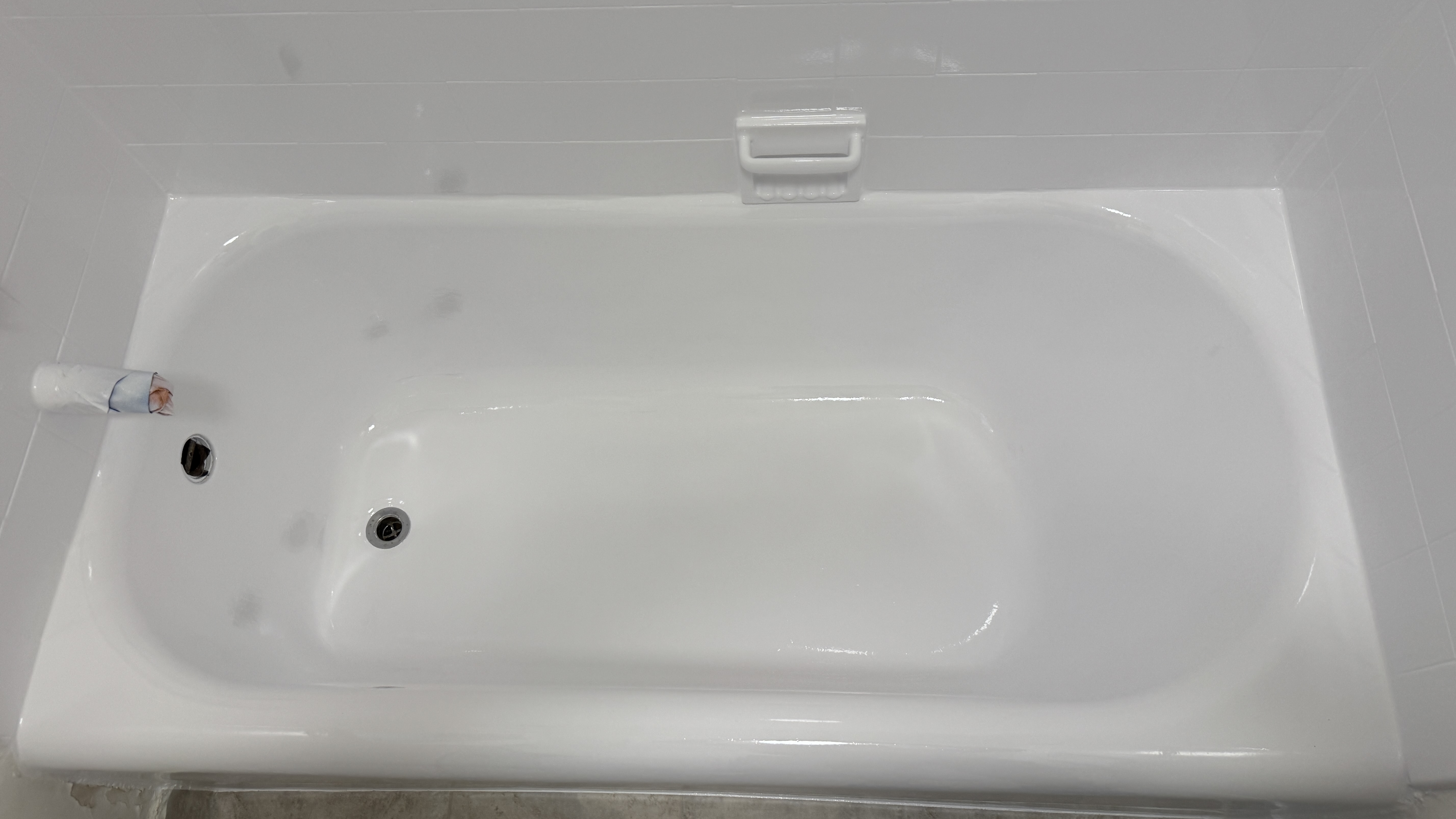 Bathtub reglazing &mdash; Fresh coating applied; fixtures protected while the finish cures &mdash; Daly City, CA