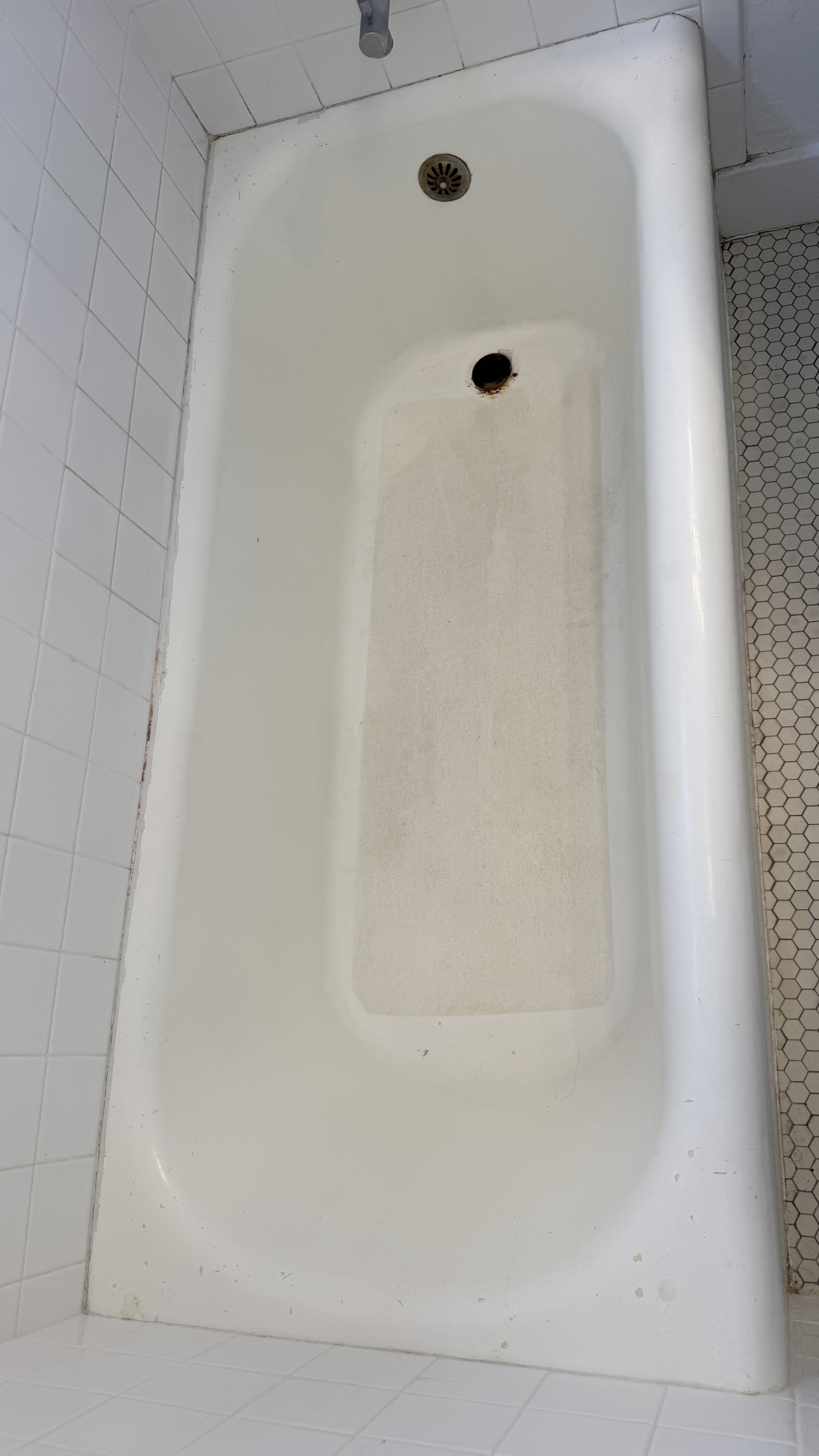 Bathtub reglazing &mdash; Stained alcove tub evaluated before stripping and recoating &mdash; Alameda, CA