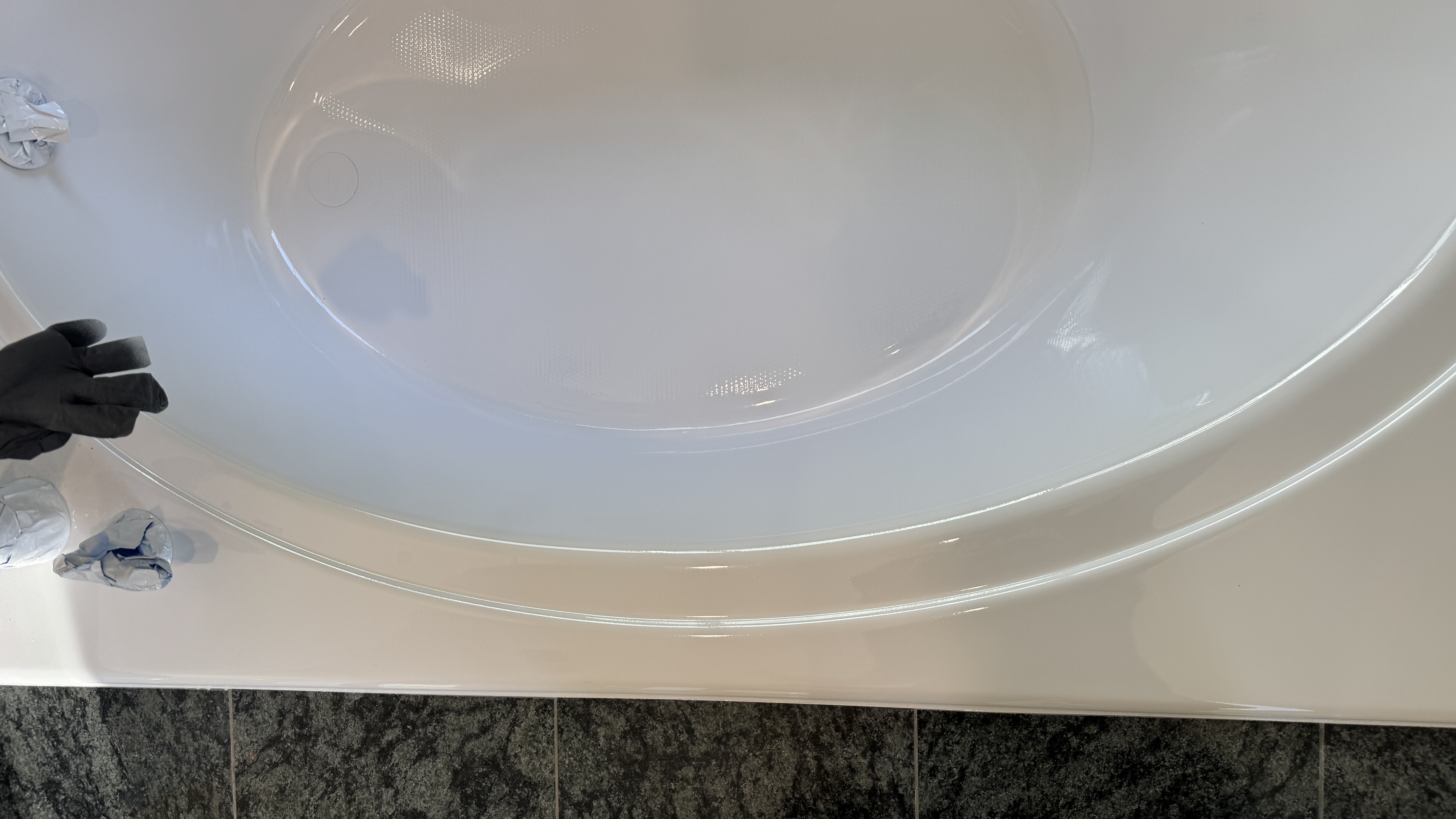 Bathtub reglazing &mdash; Reglazing completed on alcove tub with fixtures reinstalled &mdash; Alameda, CA