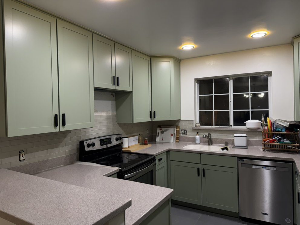 Refinished kitchen cabinets by Golden Touch-Up